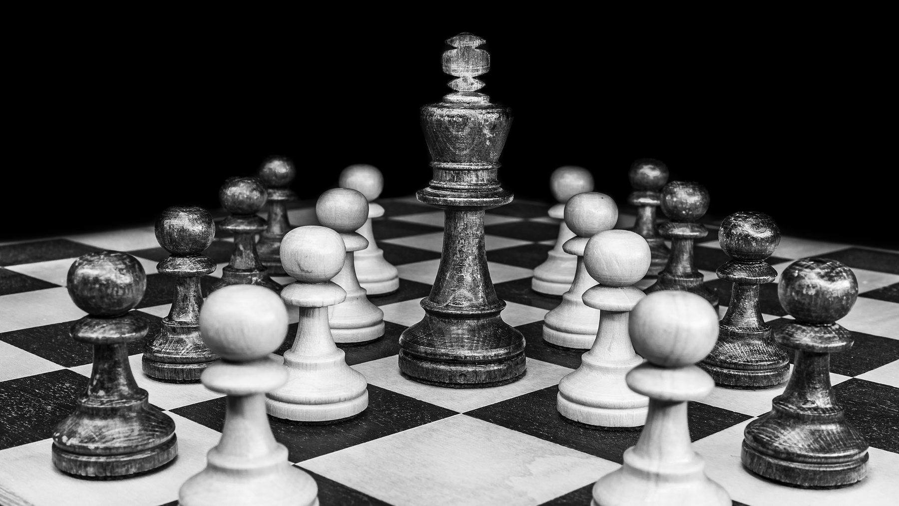 Black and White Shot of a Chessboard